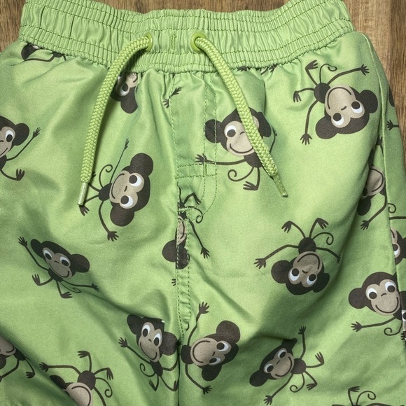 Gymboree green swim trunks w/monkeys. 12 months - Picture 3 of 7